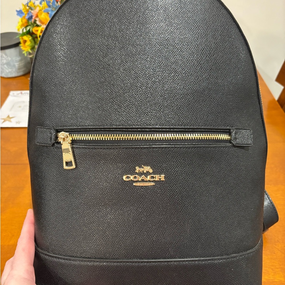 Coach Black Leather Backpack with Gold Hardware